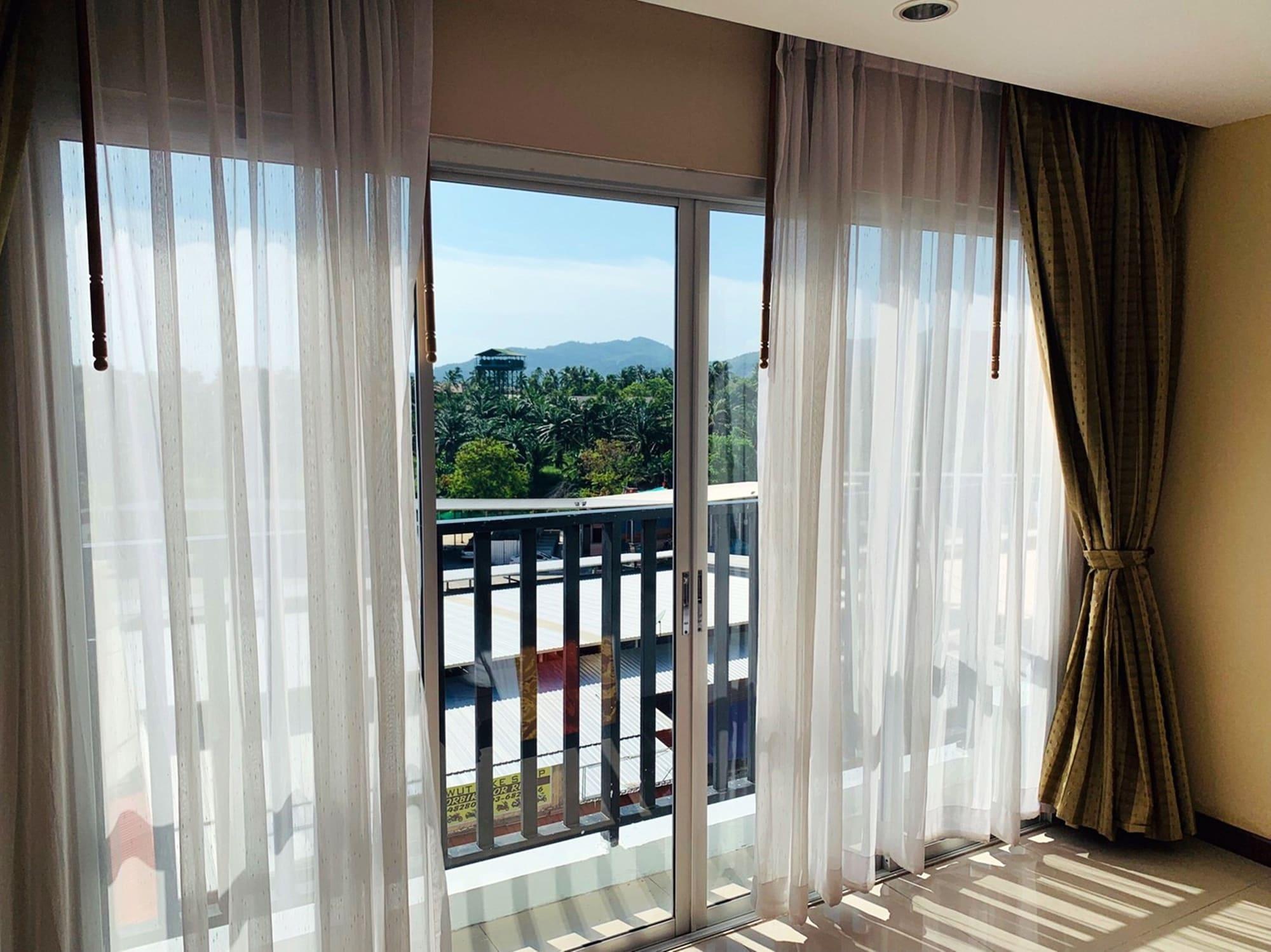 Malin Patong Hotel Bagian luar foto